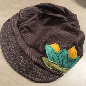 Cute brown hat with green accents